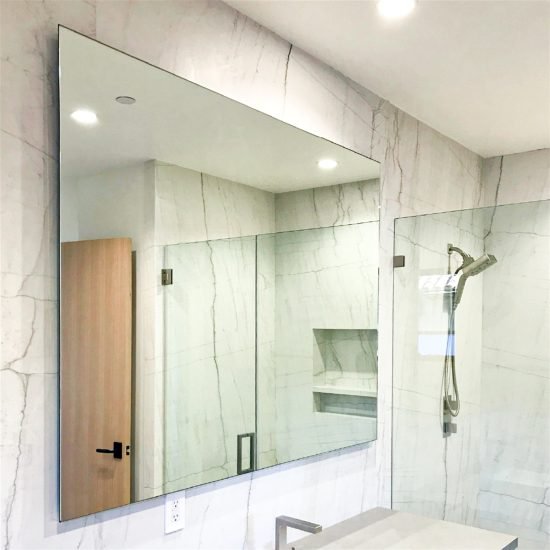 Frameless glass mirror installation